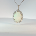 Load image into Gallery viewer, Oval Opal Halo Pendant Necklace in White Gold