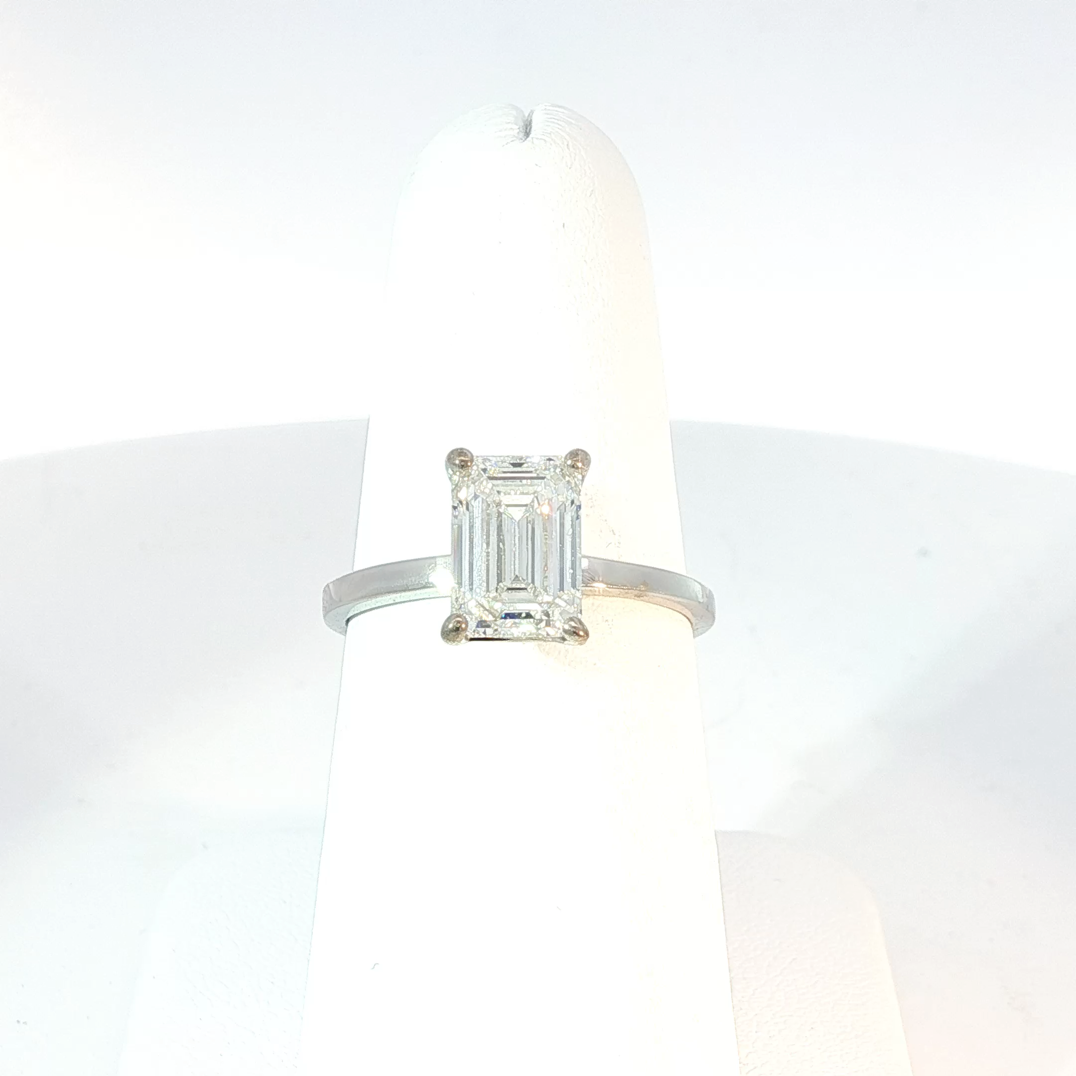 Solitaire Ring with Emerald Cut Diamond