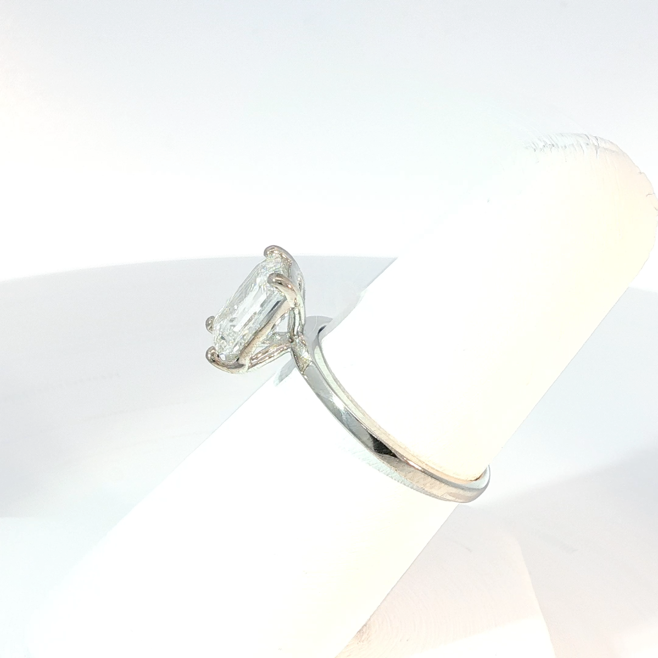 Solitaire Ring with Emerald Cut Diamond