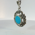 Load image into Gallery viewer, Silver Charm Necklace with Bluish Green Turquoise Cabochon
