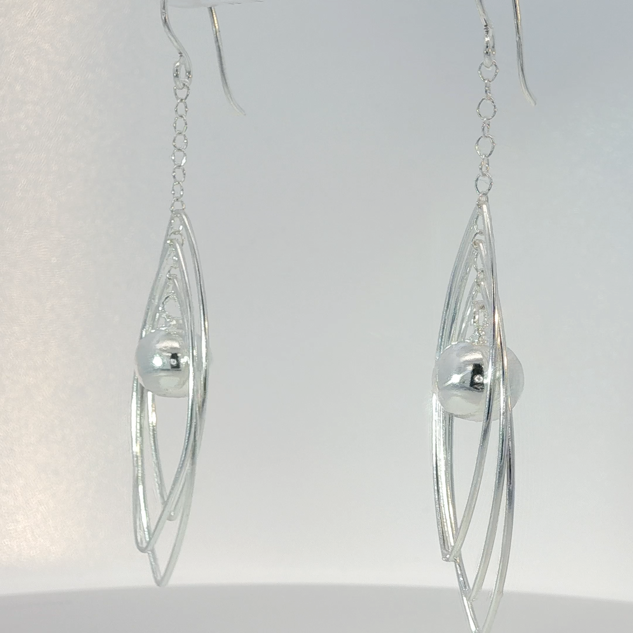 Sterling Silver Triple Oval Dangle Earrings with Spherical Accent