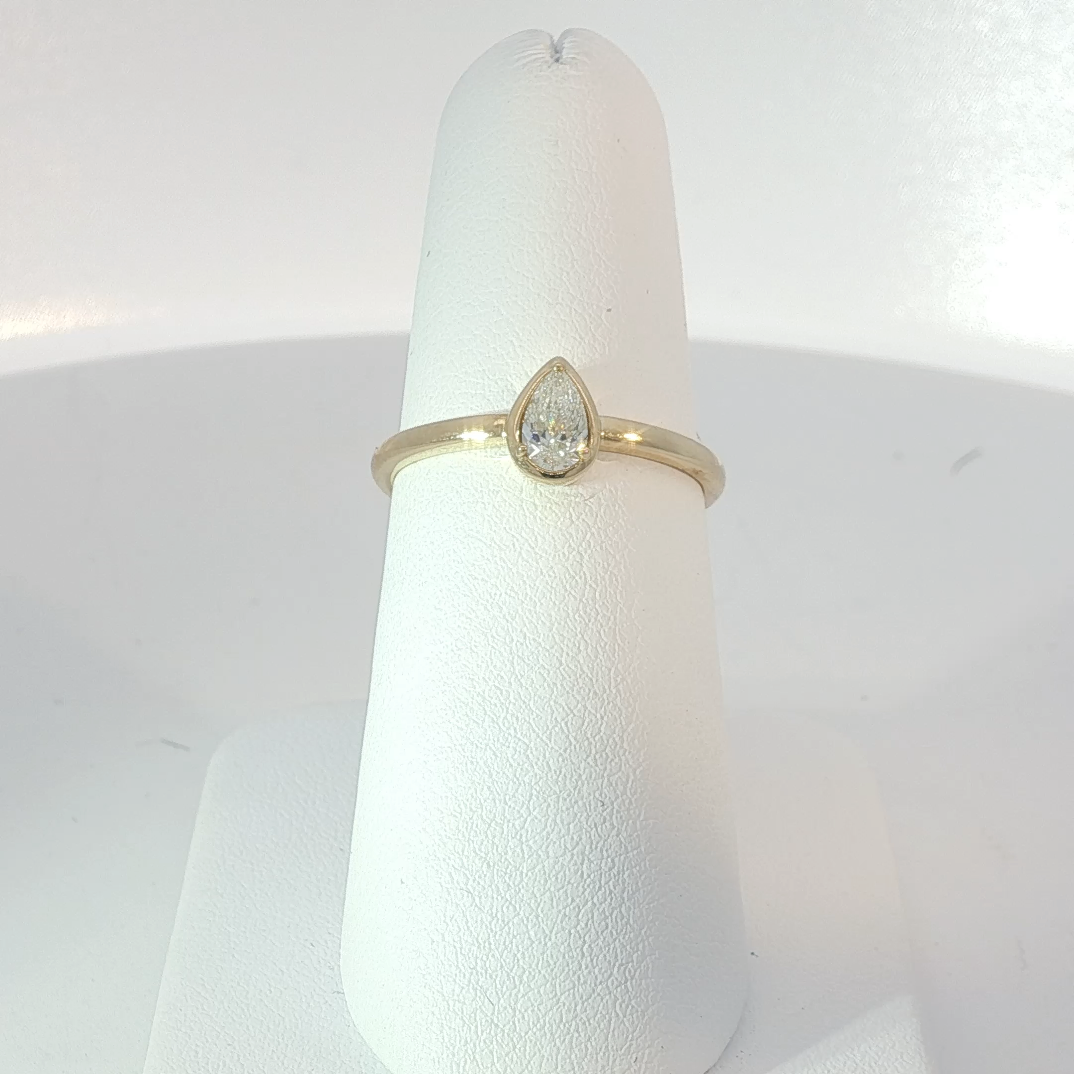 Pear Cut Diamond Solitaire Ring in Yellow Gold