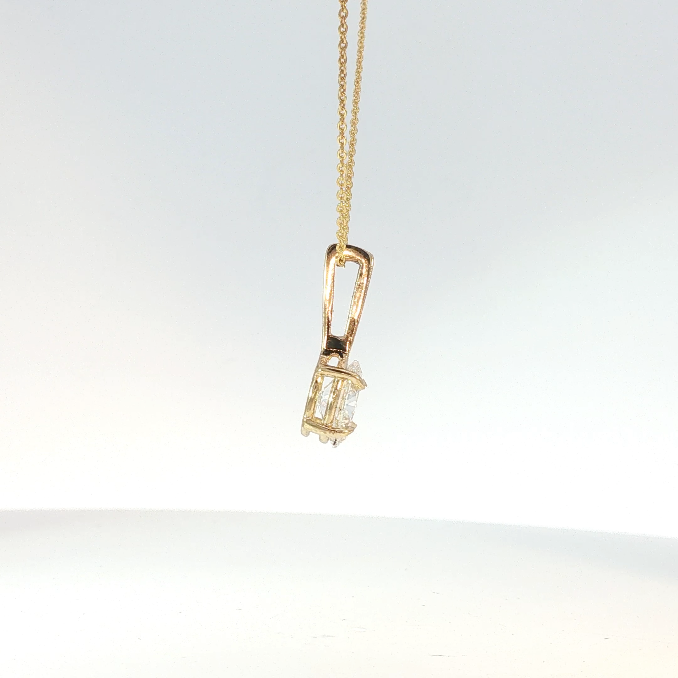 Oval Cut Diamond Pendant Necklace in Yellow Gold