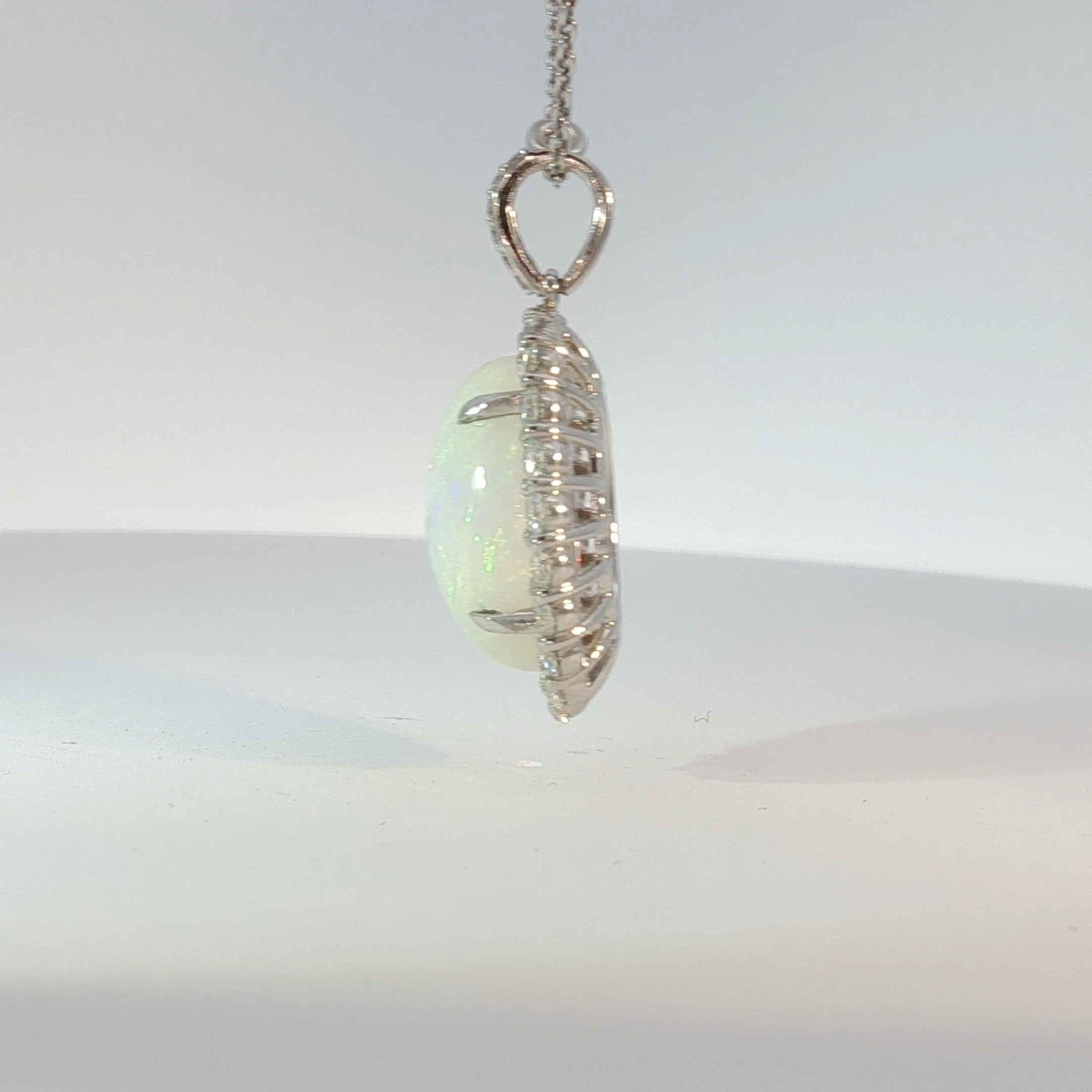 Oval Opal Halo Pendant Necklace in White Gold
