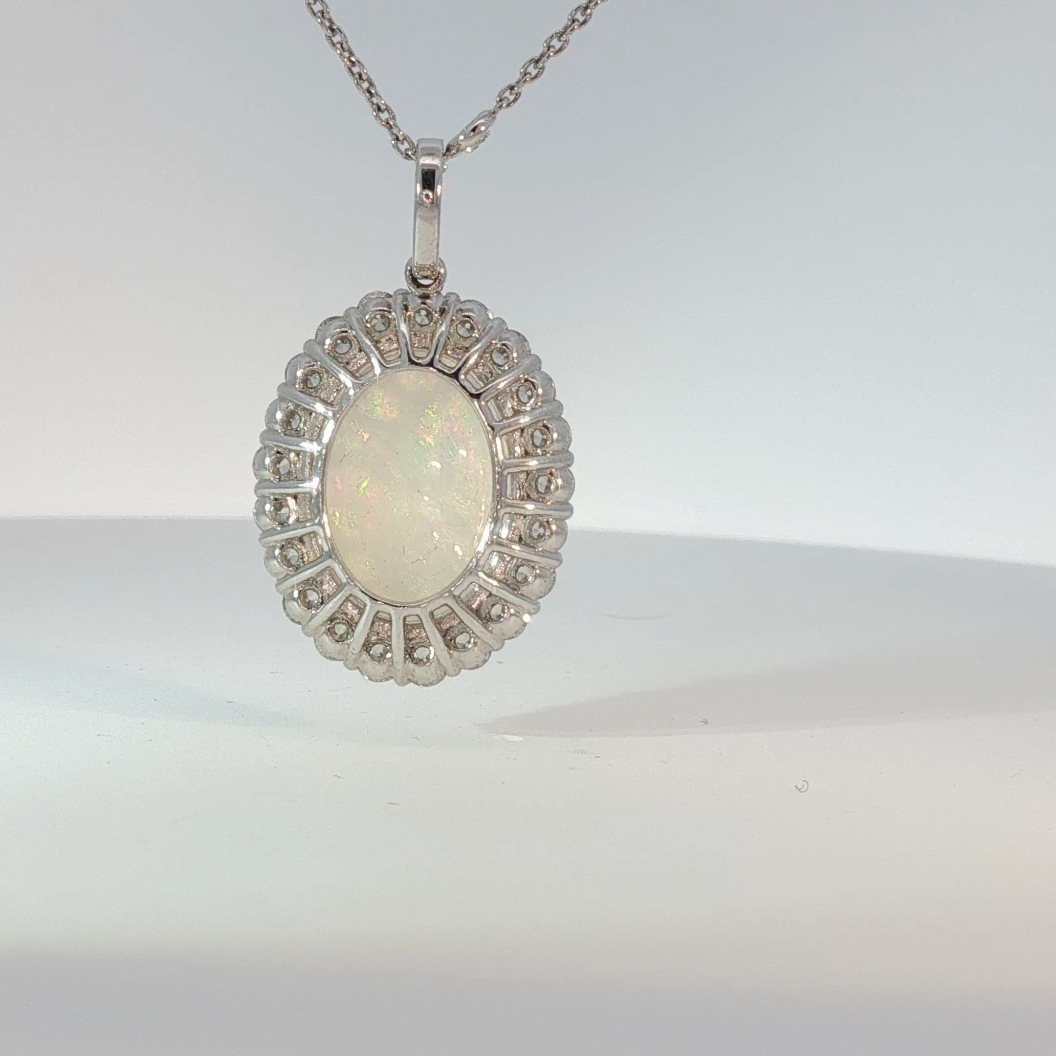 Oval Opal Halo Pendant Necklace in White Gold