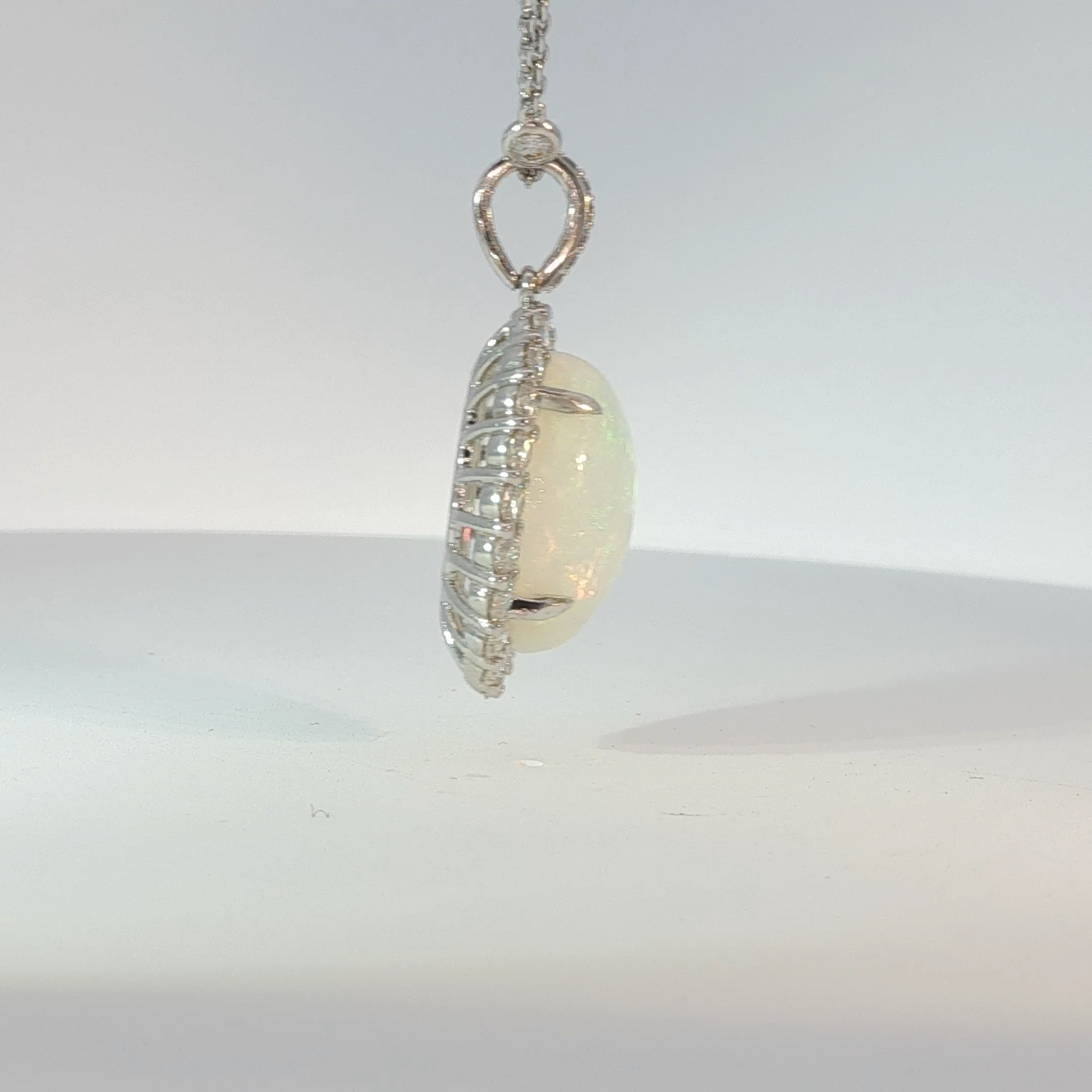 Oval Opal Halo Pendant Necklace in White Gold