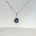 Load image into Gallery viewer, White Gold Royal Blue Sapphire Halo Pendant Necklace
