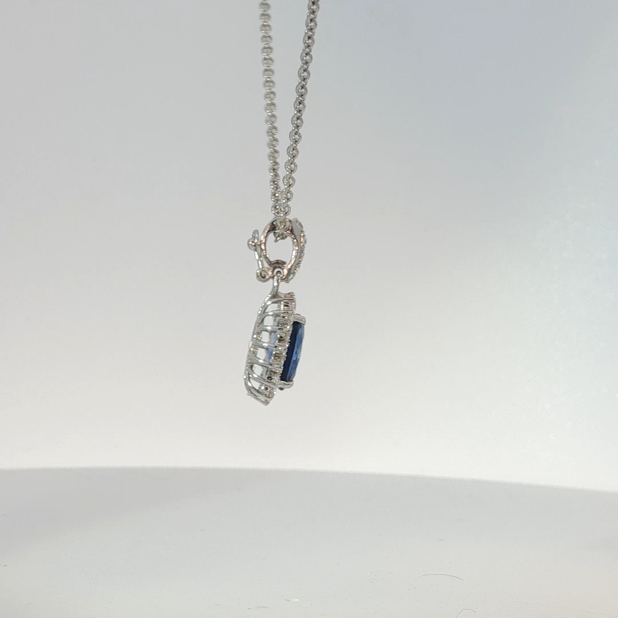 White Gold Royal Blue Sapphire Halo Pendant Necklace