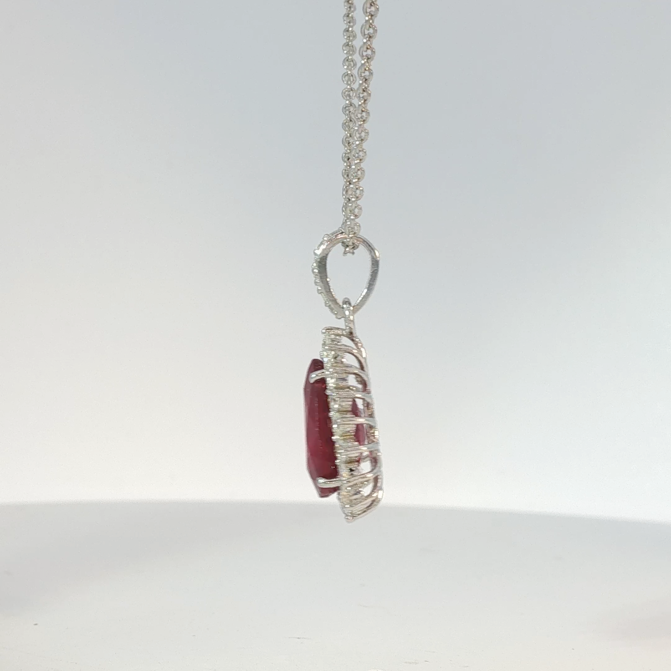 Pear-Shaped Pigeon Blood Ruby Halo Pendant in White Gold