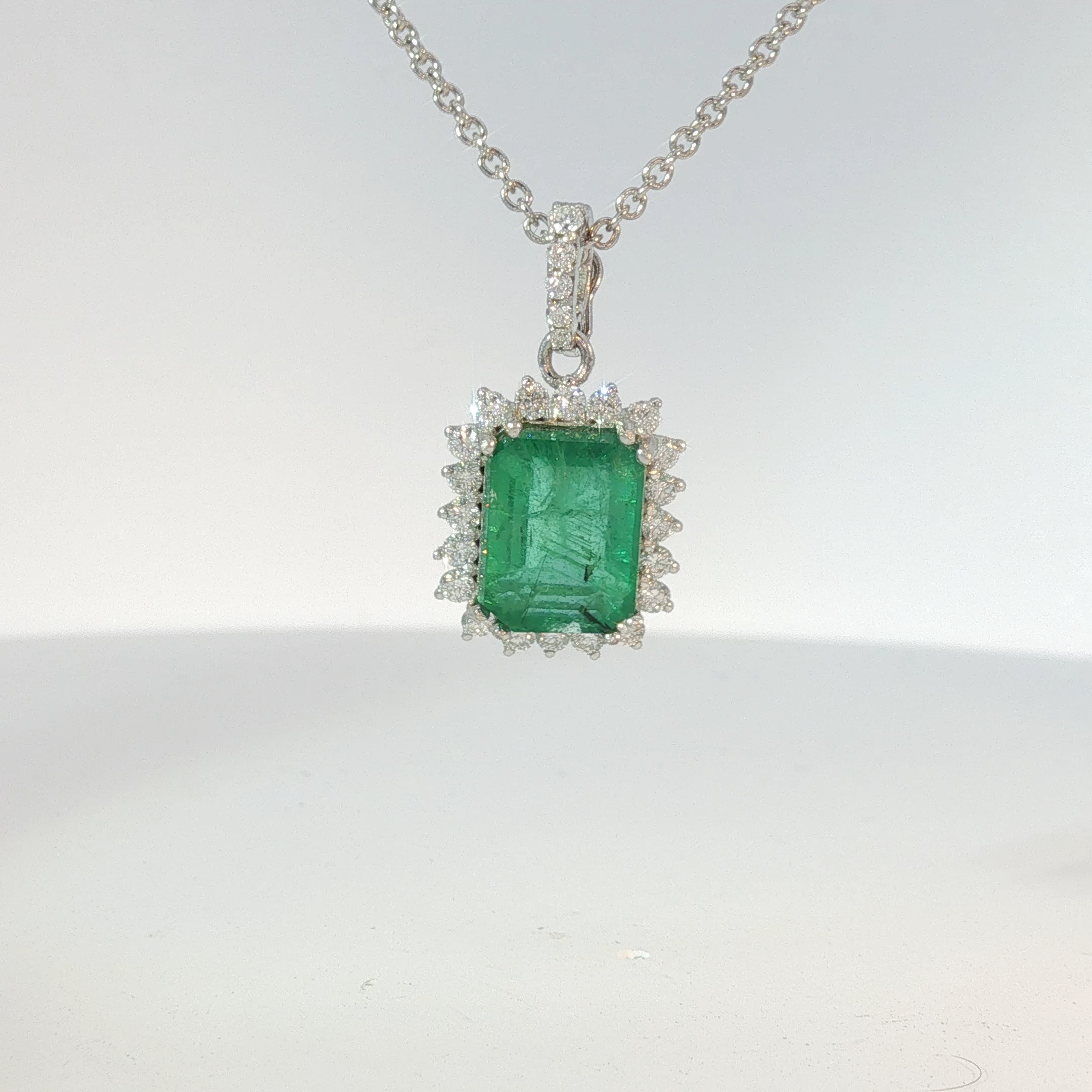 Emerald-Cut Emerald Halo Pendant