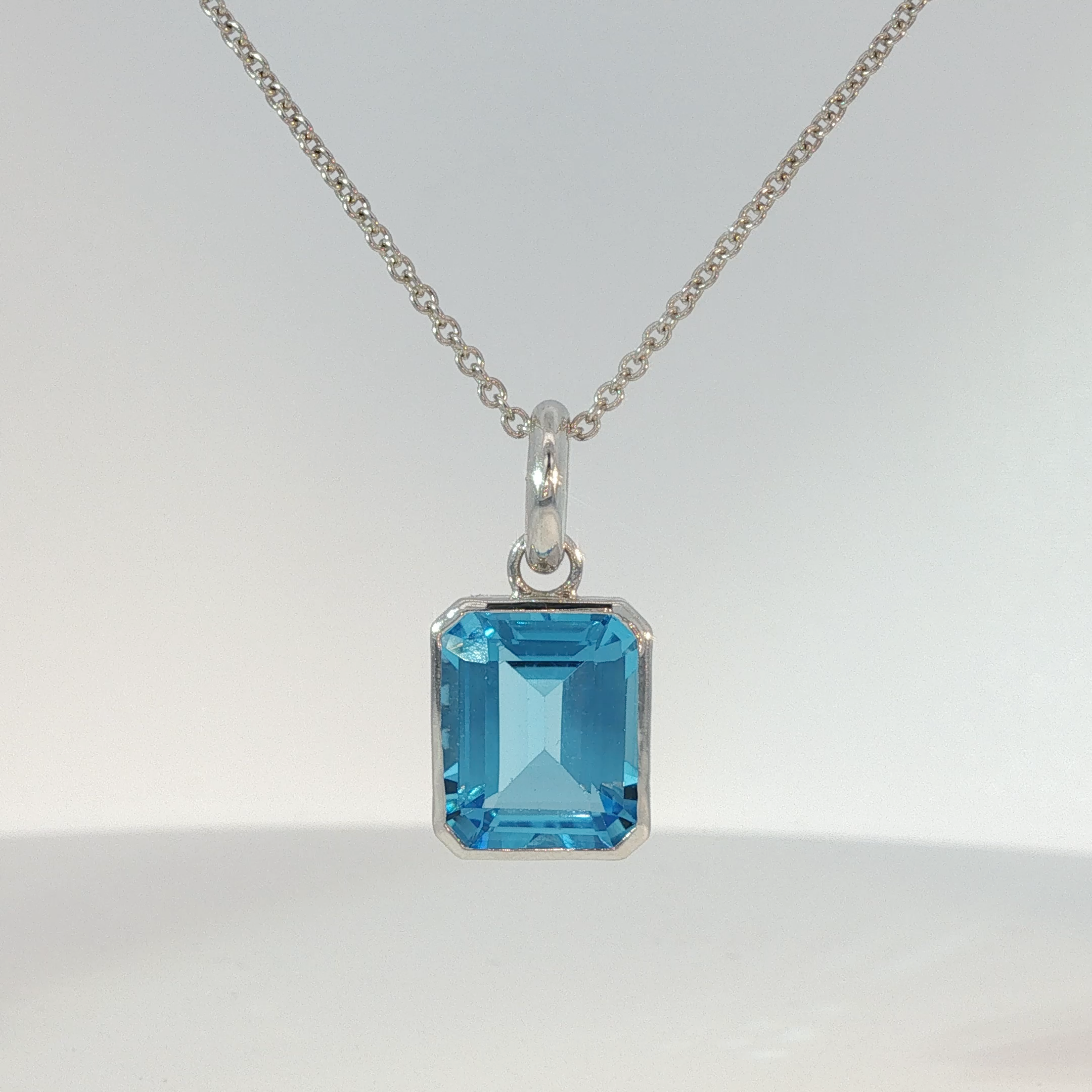 White Gold Bezel-Set Blue Topaz Pendant
