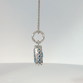 Load image into Gallery viewer, White Gold Bezel-Set Blue Topaz Pendant
