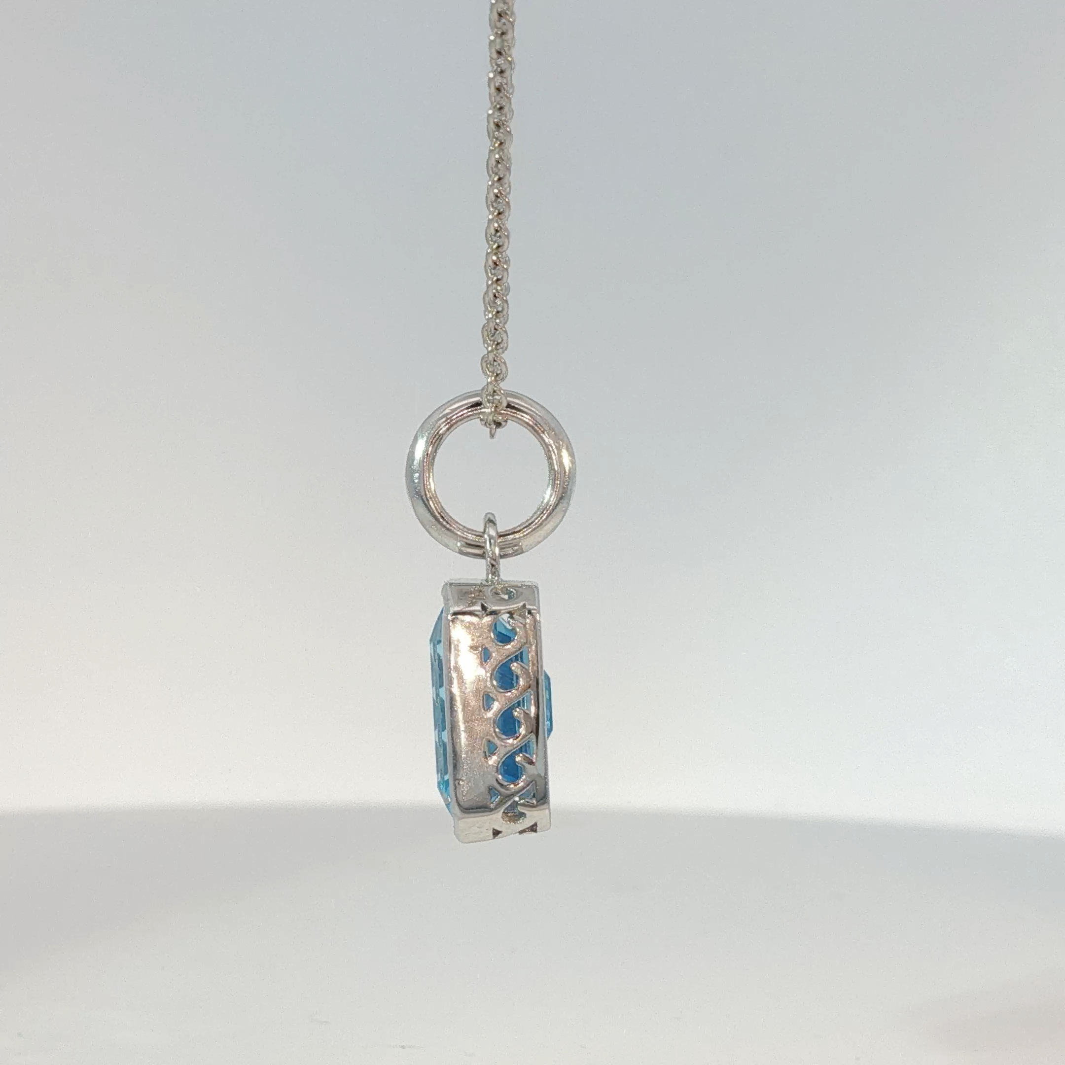 White Gold Bezel-Set Blue Topaz Pendant