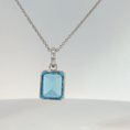 Load image into Gallery viewer, White Gold Bezel-Set Blue Topaz Pendant
