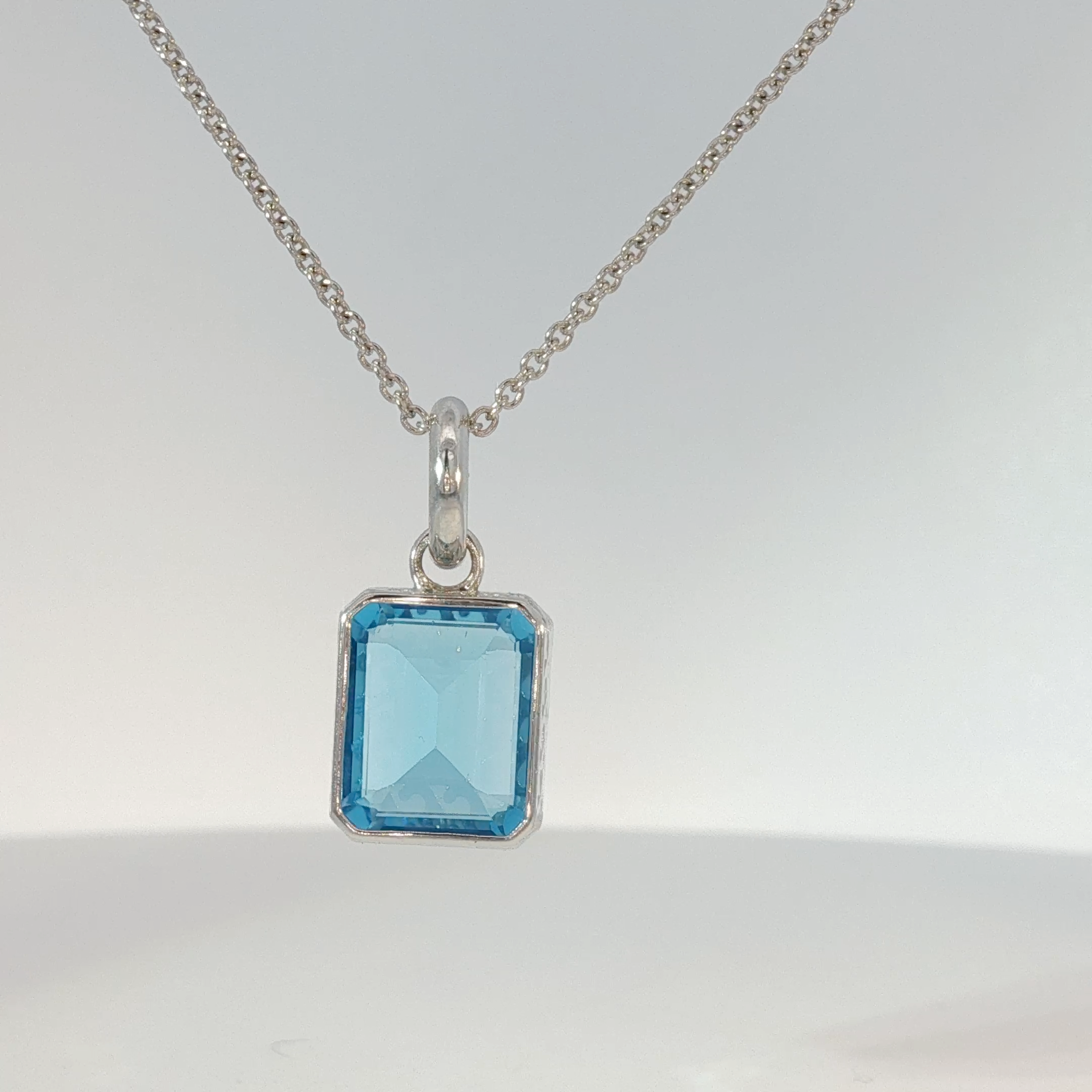 White Gold Bezel-Set Blue Topaz Pendant