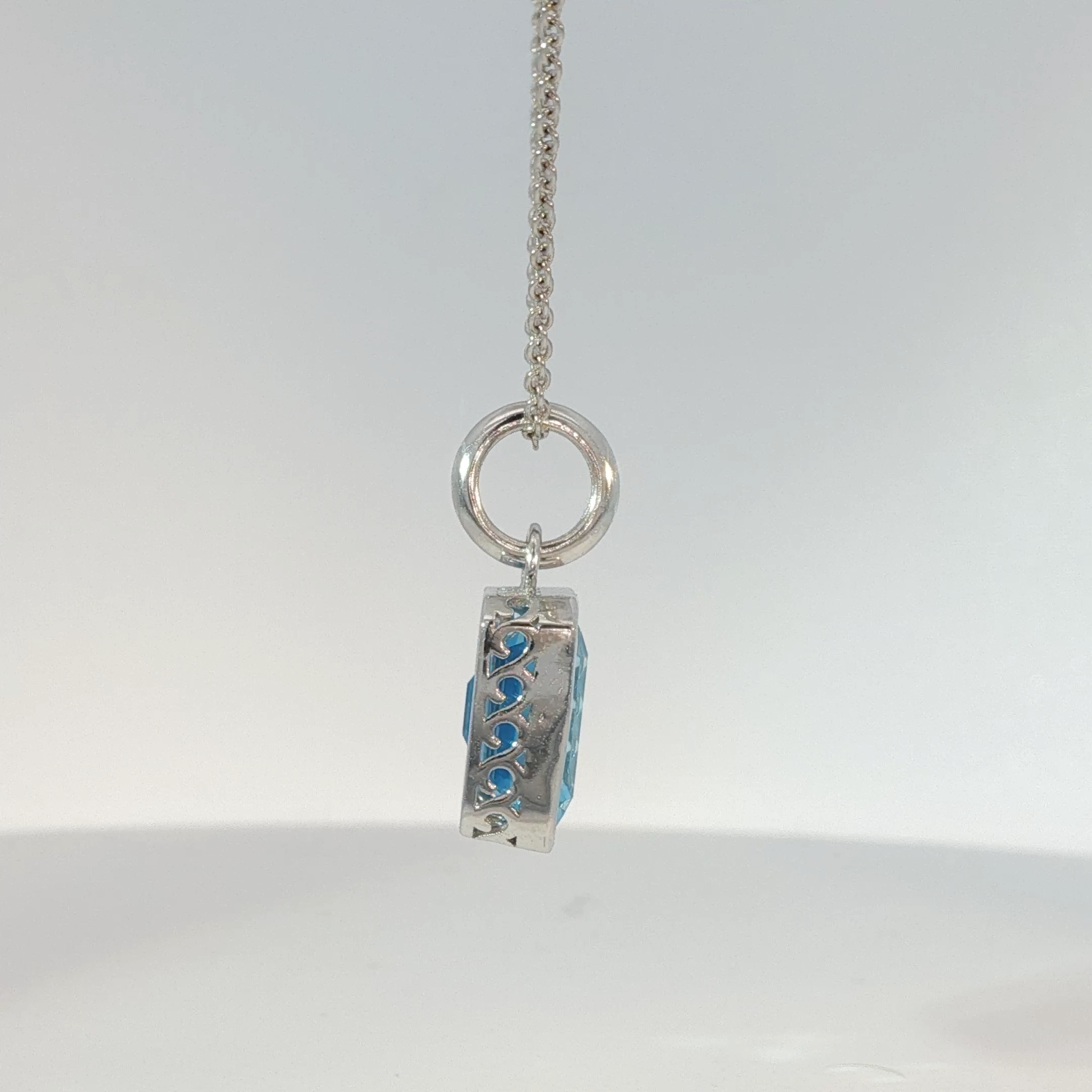 White Gold Bezel-Set Blue Topaz Pendant