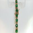 Load image into Gallery viewer, Oval Emerald Tennis Bracelet in Yellow Gold
