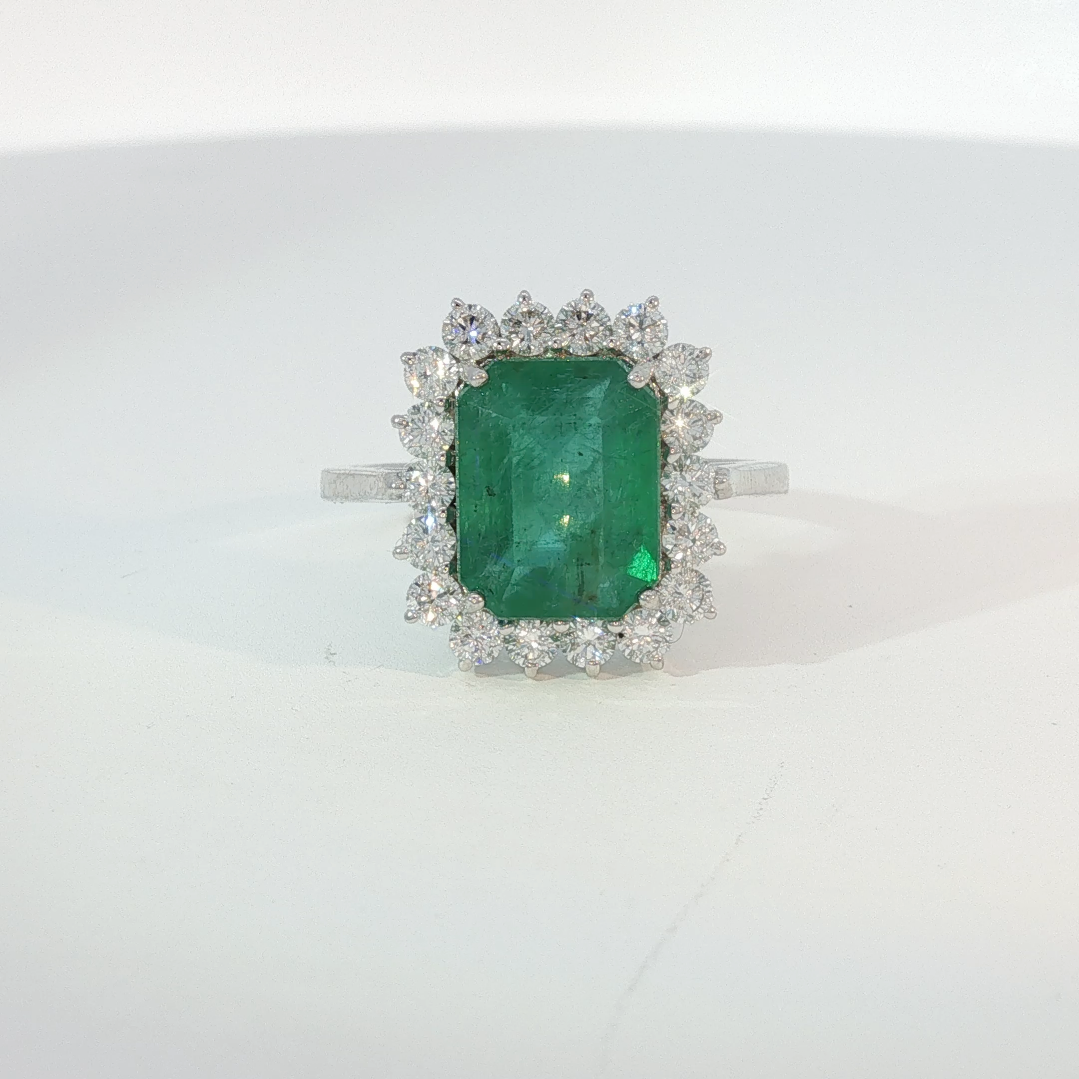 Emerald Halo Cocktail Ring in White Gold
