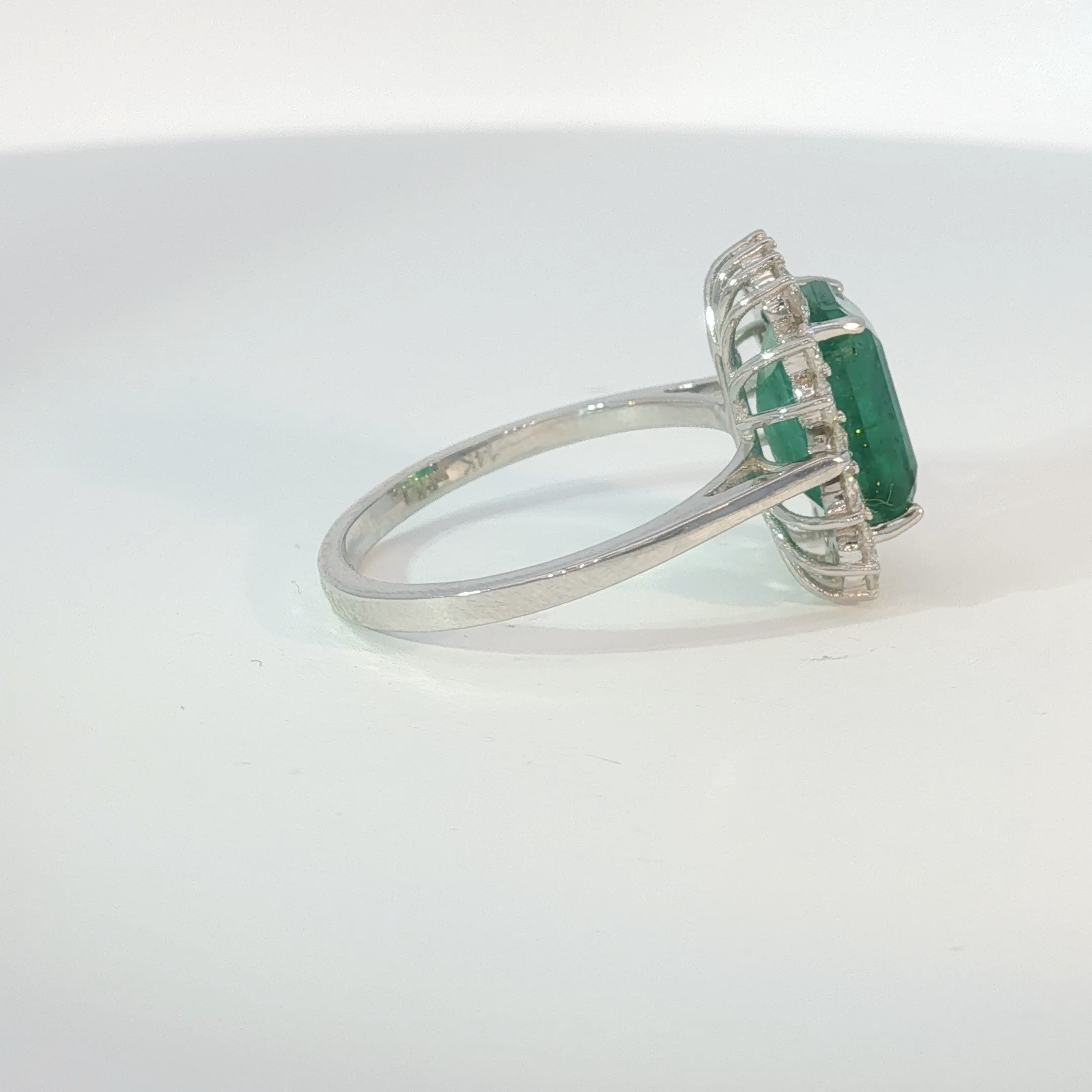 Emerald Halo Cocktail Ring in White Gold