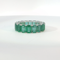 Load image into Gallery viewer, Emerald-Cut Emerald Eternity Ring in White Gold
