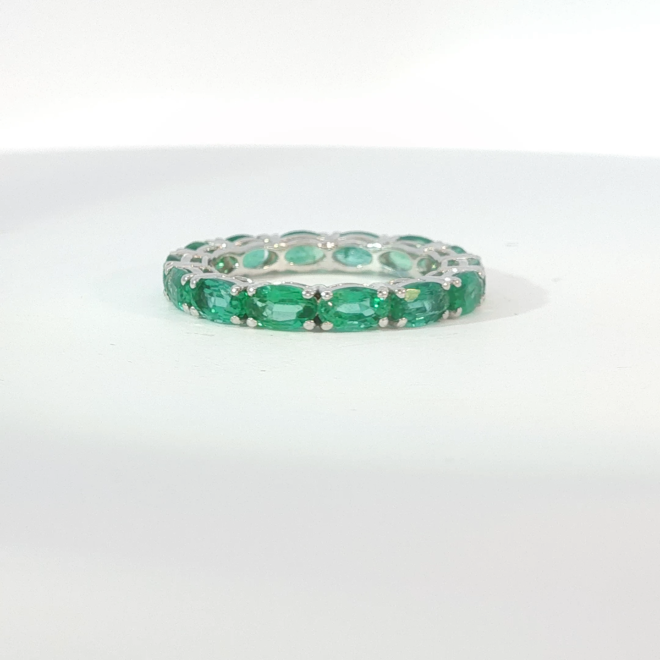 Oval Emerald Eternity Ring in White Gold