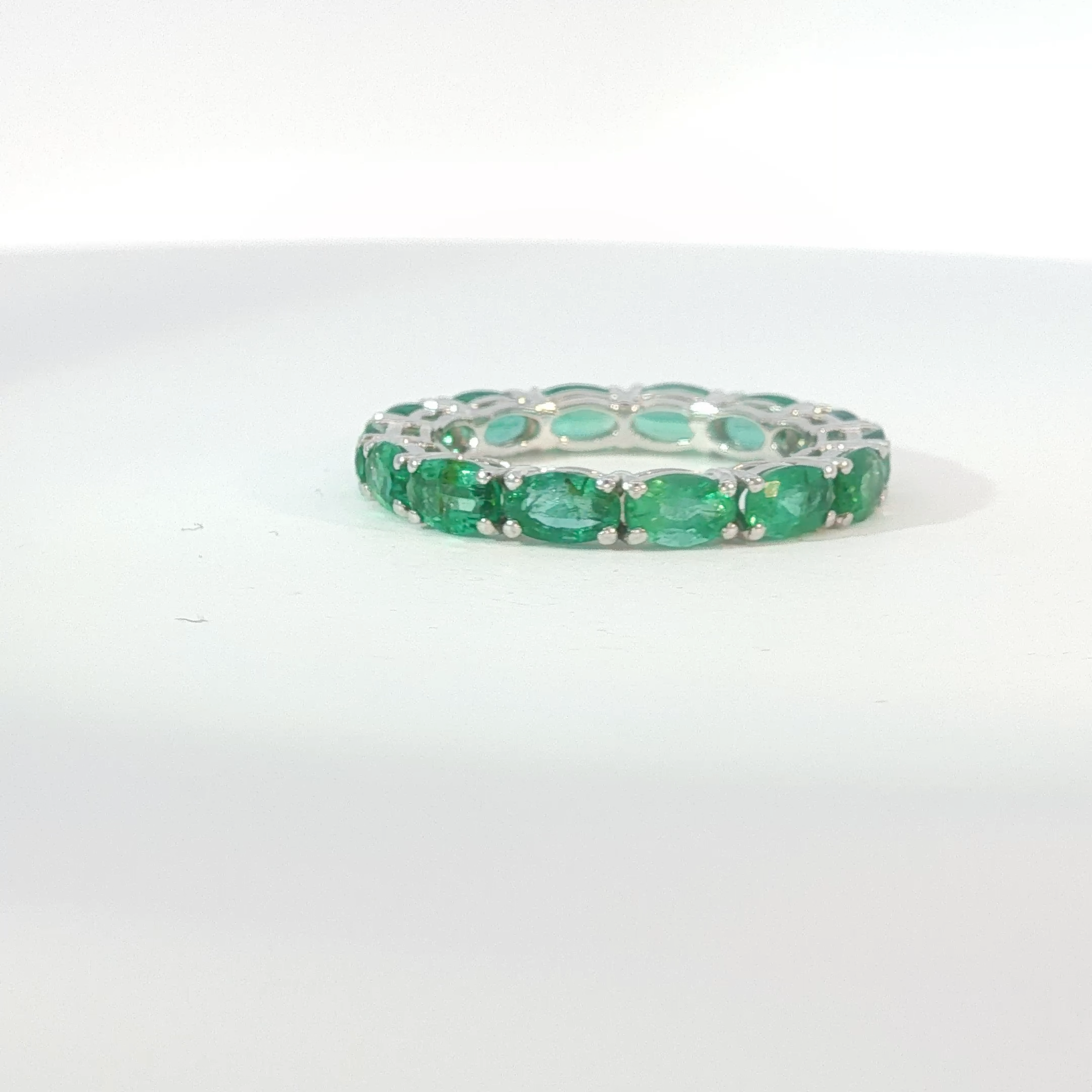 Oval Emerald Eternity Ring in White Gold