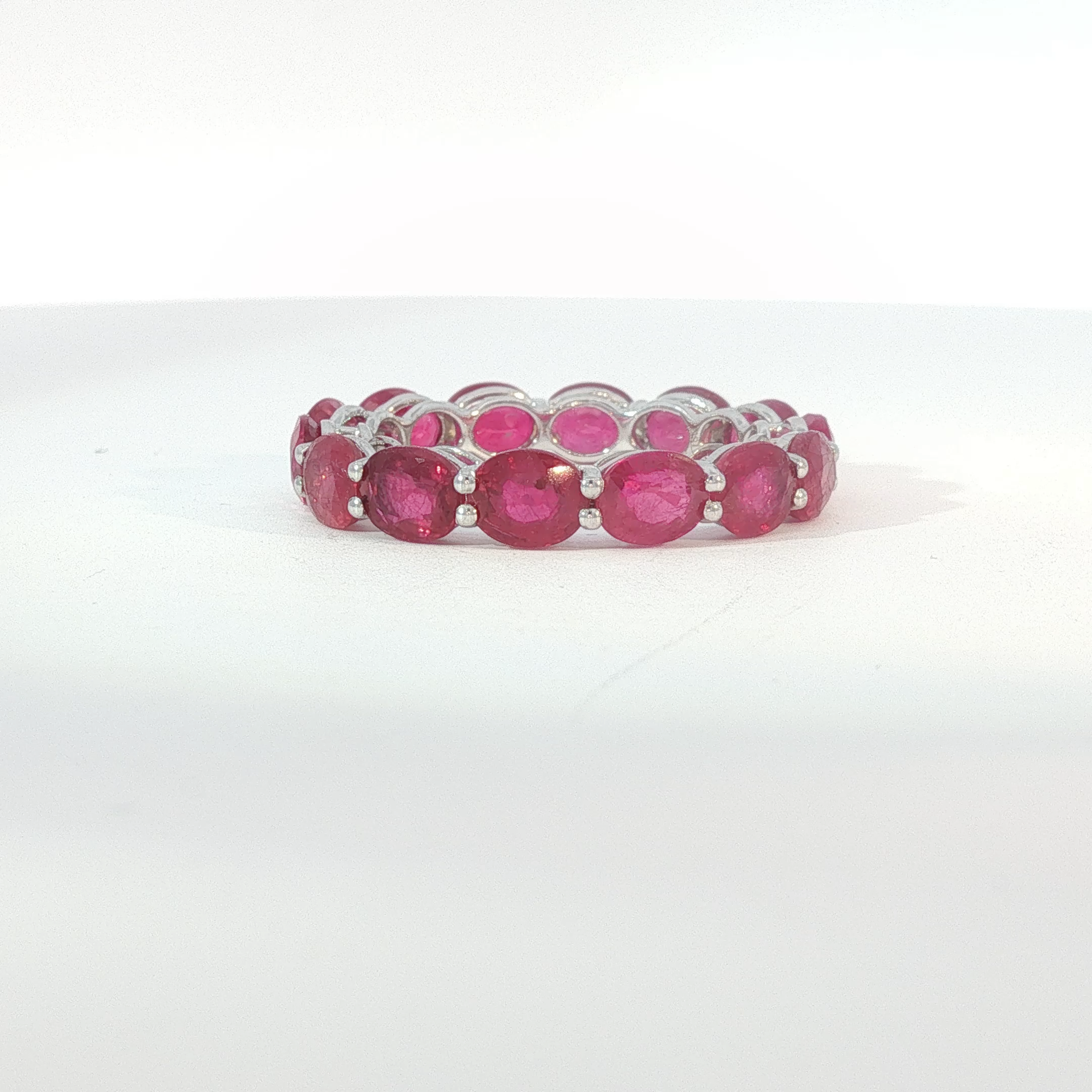 White Gold Oval Ruby Eternity Band