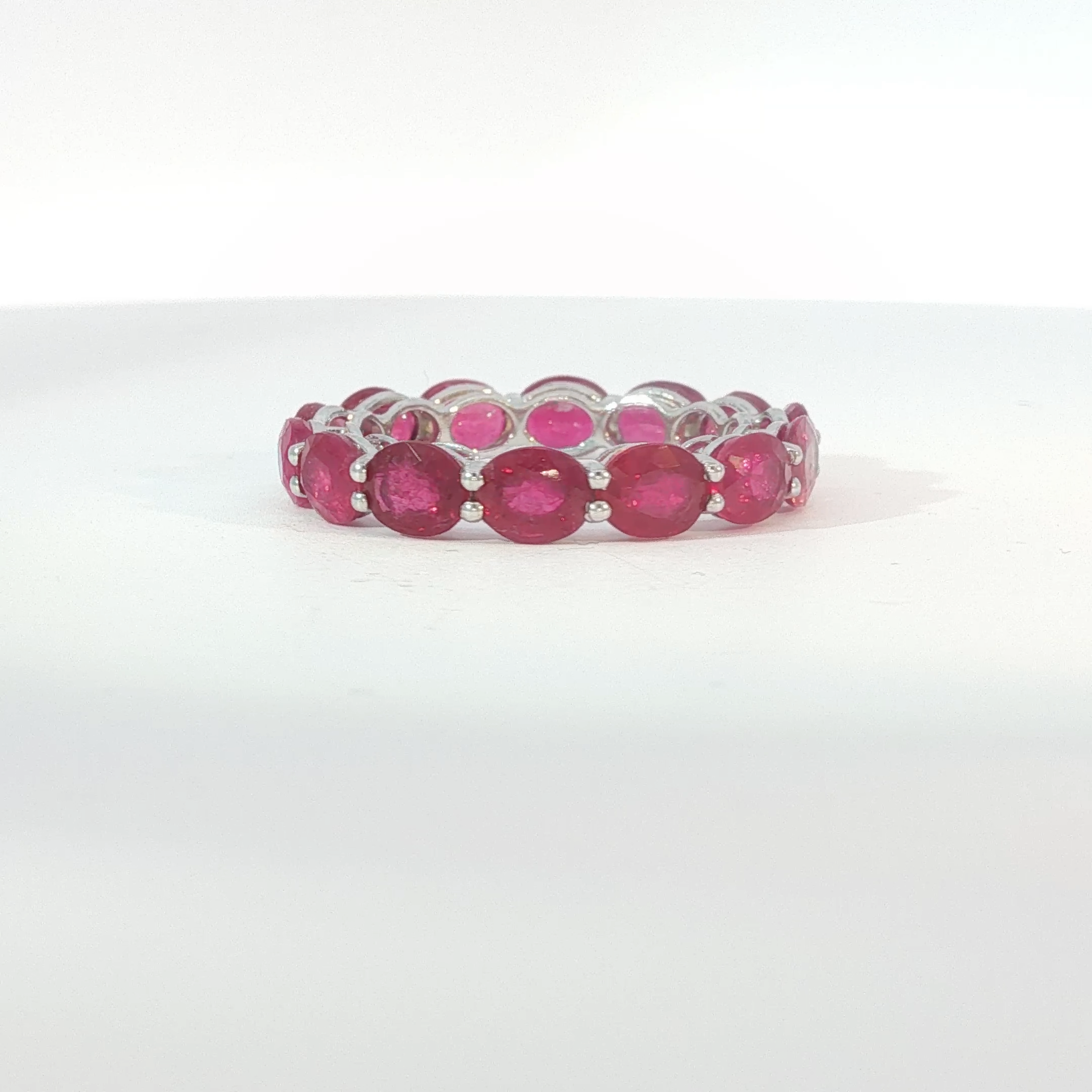 White Gold Oval Ruby Eternity Band