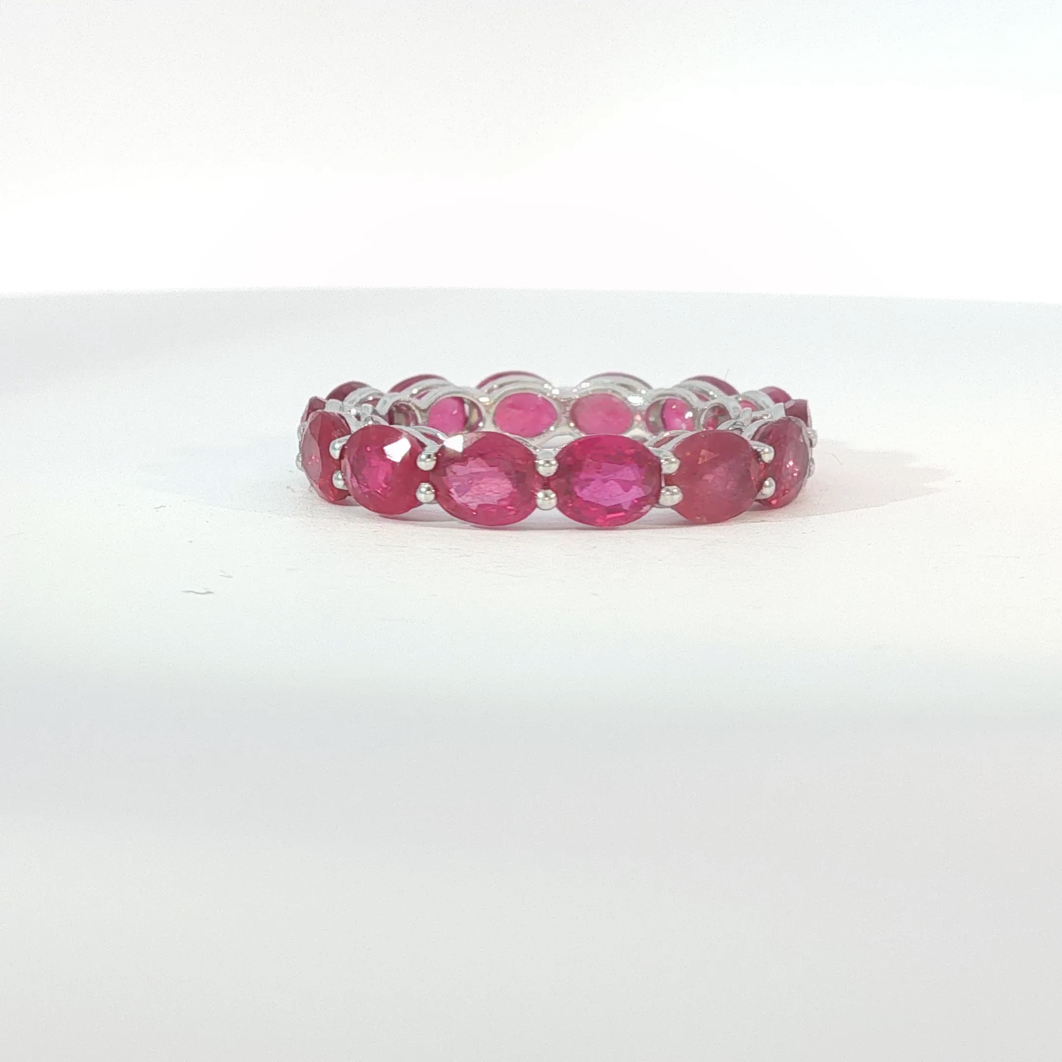 White Gold Oval Ruby Eternity Band
