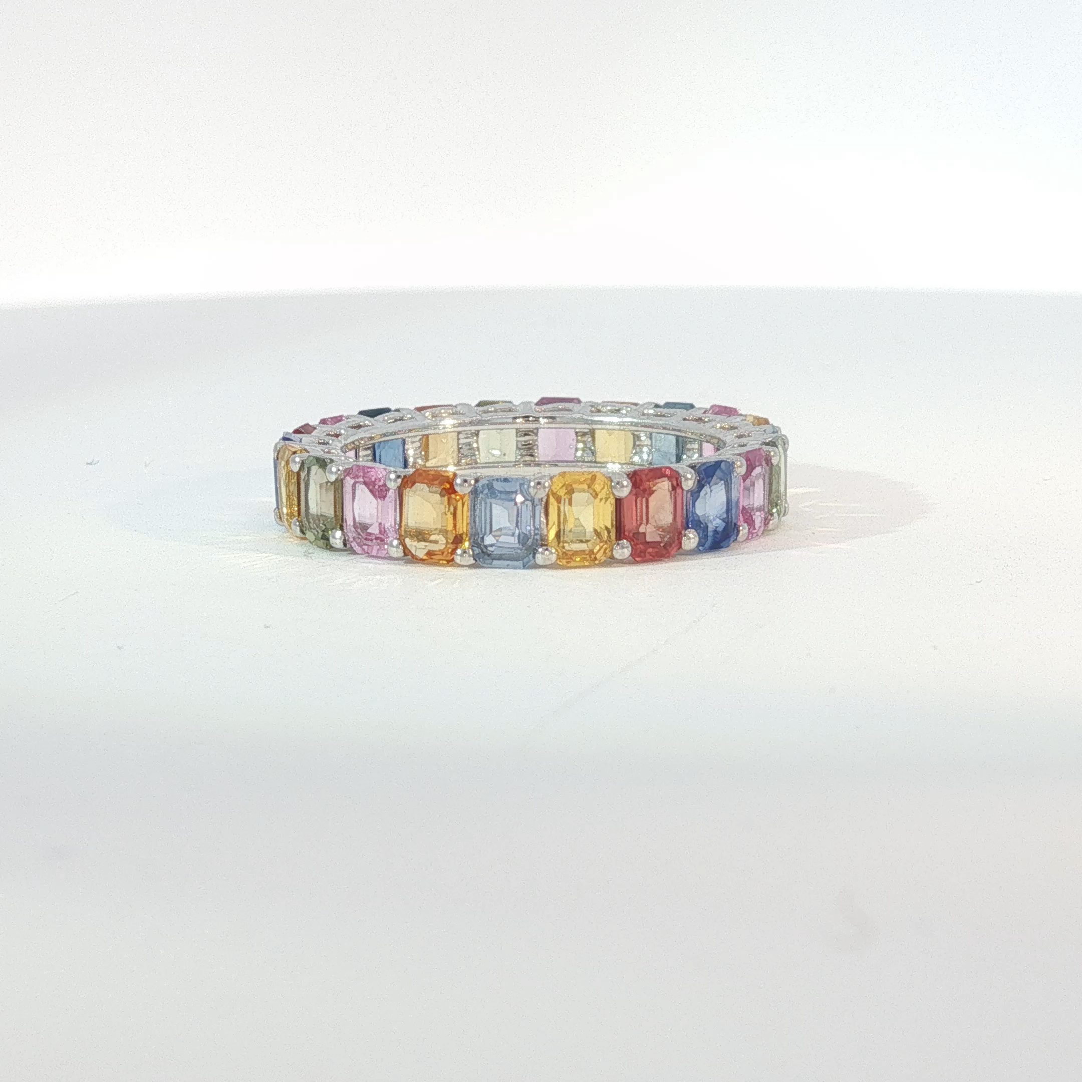 Multi-Color Sapphire Emerald Cut Eternity Ring in White Gold