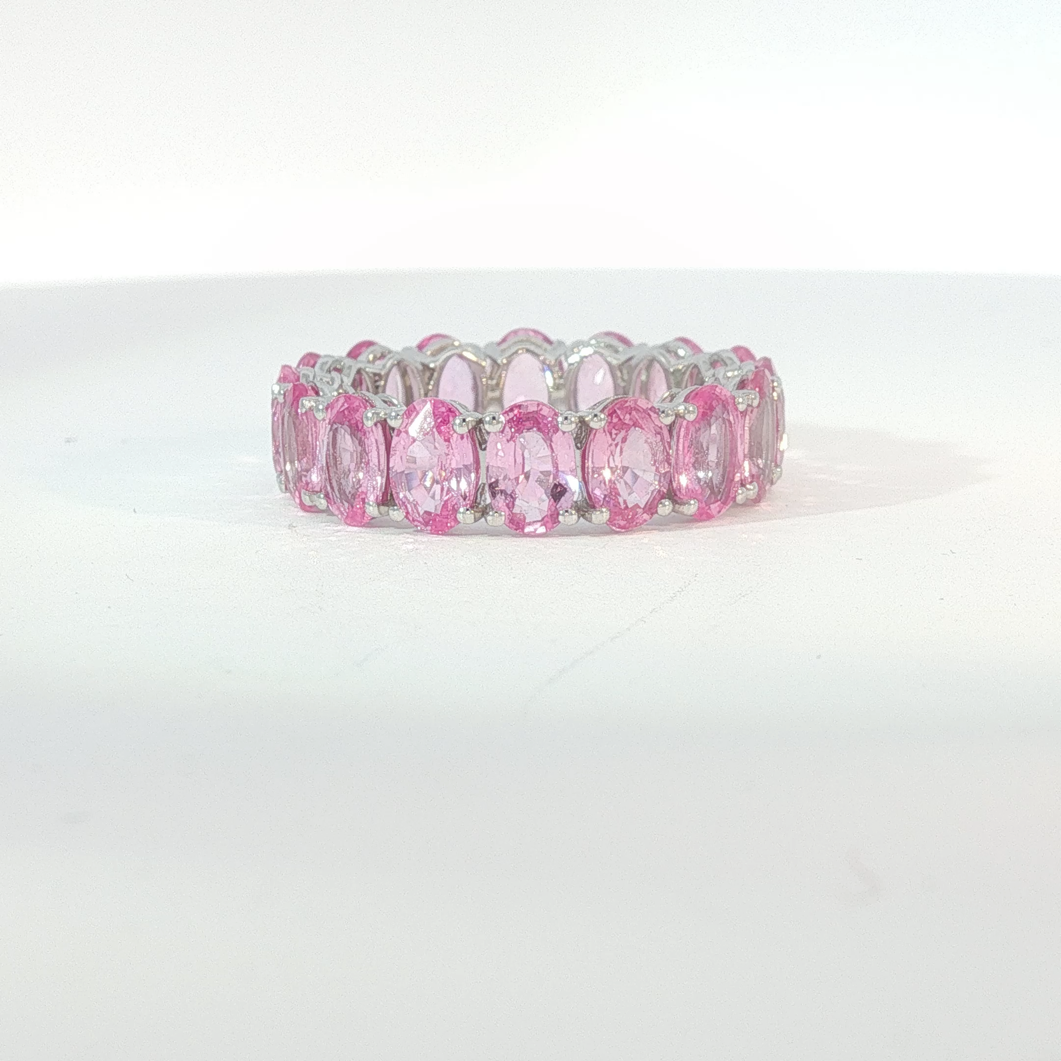 Oval Pink Sapphire Eternity Ring in White Gold