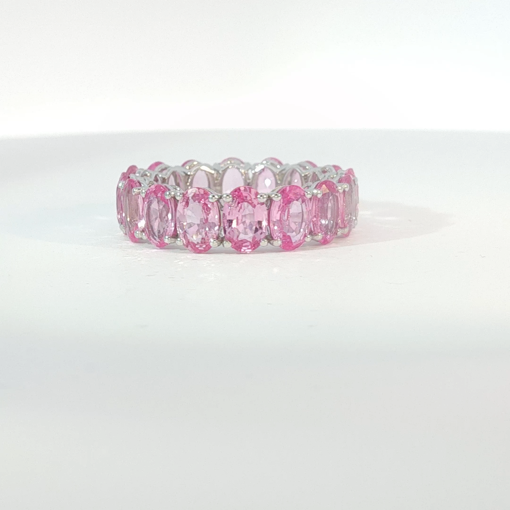 Oval Pink Sapphire Eternity Ring in White Gold