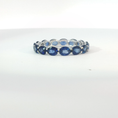 Load image into Gallery viewer, Oval Royal Blue Sapphire White Gold Eternity Ring
