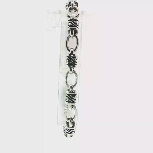 Elegant Silver Chain Link Bracelet with Decorated Barrel Beads