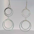 Load and play video in Gallery viewer, Sterling Silver Double Circle Dangle Earrings
