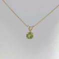 Load and play video in Gallery viewer, Round Cut Peridot Solitaire Pendant in Yellow Gold
