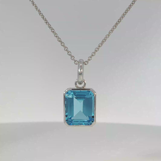 White Gold Bezel-Set Blue Topaz Pendant