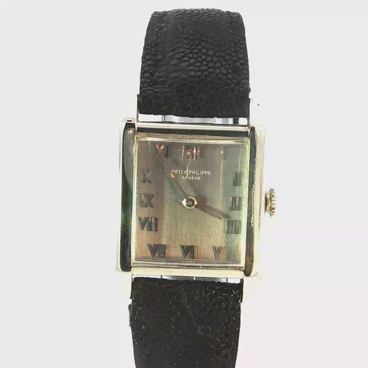 18K Patek Philippe Genève Watch with Roman Numerals and Textured Black Strap