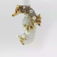Load and play video in Gallery viewer, Gold Seaman Schepps Brooch with Pearl Cabochons
