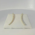 Load and play video in Gallery viewer, Curved Diamond Earrings
