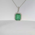 Load and play video in Gallery viewer, Emerald-Cut Emerald Halo Pendant
