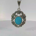 Load and play video in Gallery viewer, Silver Charm Necklace with Bluish Green Turquoise Cabochon
