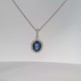 Load and play video in Gallery viewer, White Gold Royal Blue Sapphire Halo Pendant Necklace
