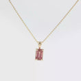 Load and play video in Gallery viewer, Emerald-Cut Pink Tourmaline Pendant Necklace in Yellow Gold
